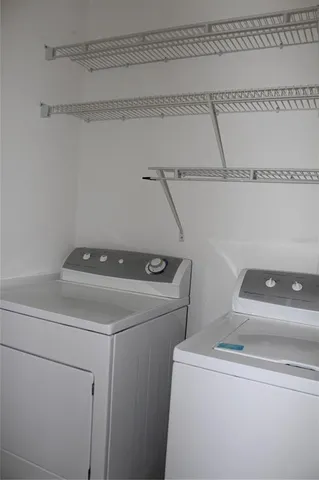 a bathroom with a sink a toilet a mirror and vanity