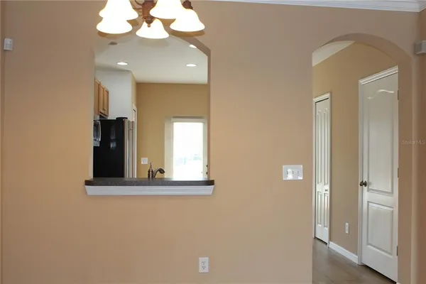 en view of a bathroom with a sink and a mirror