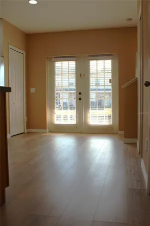 an empty room with windows