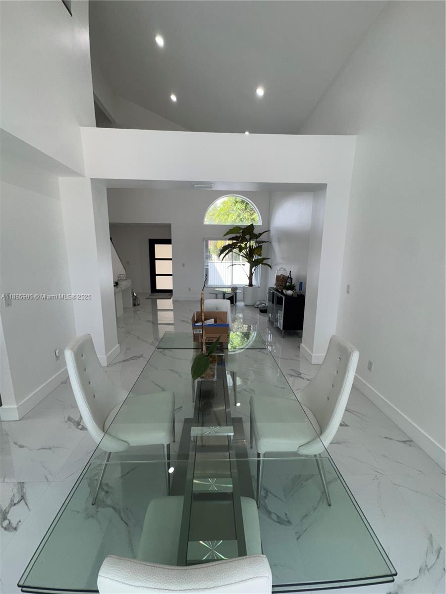 11111 Southwest 147th Court Miami, FL 33196 - Photo 11 of 42 a living room with furniture and wooden floor