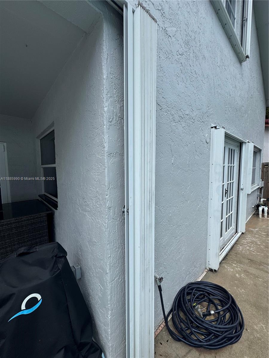 11111 Southwest 147th Court Miami, FL 33196 - Photo 17 of 42 a room with furniture and a rug