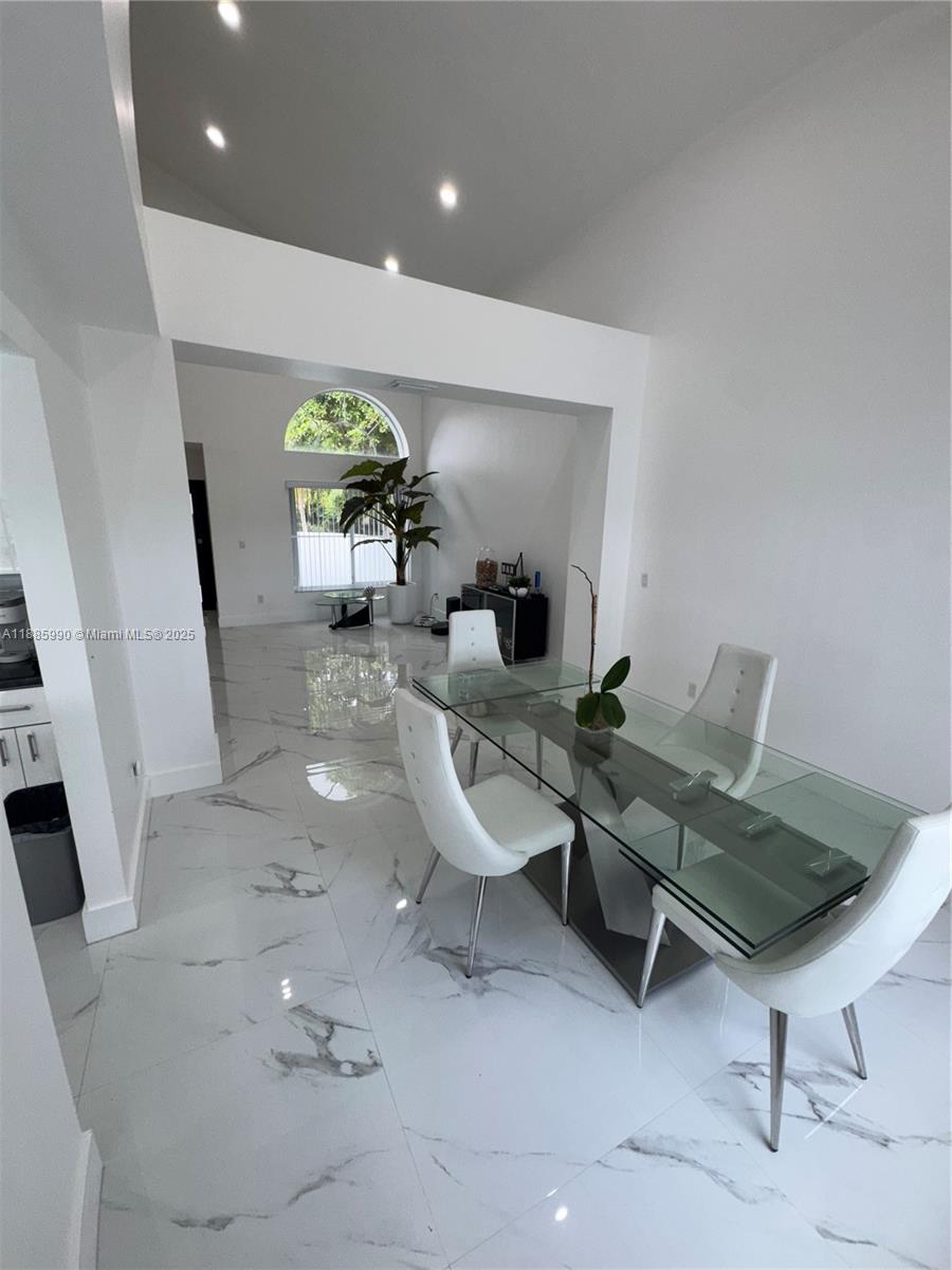 11111 Southwest 147th Court Miami, FL 33196 - Photo 23 of 42 a room with furniture and a potted plant