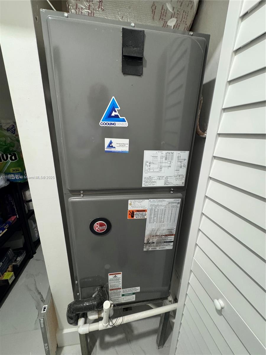 11111 Southwest 147th Court Miami, FL 33196 - Photo 28 of 42 a view of water heater room