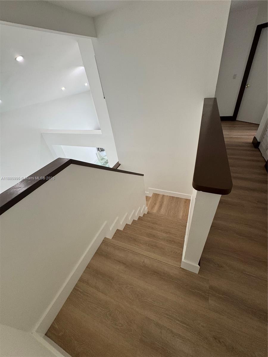11111 Southwest 147th Court Miami, FL 33196 - Photo 30 of 42 a view of wooden floor and stairs
