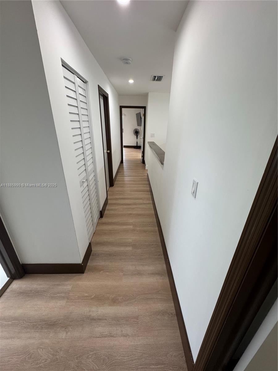 11111 Southwest 147th Court Miami, FL 33196 - Photo 33 of 42 a view of a hallway with stairs
