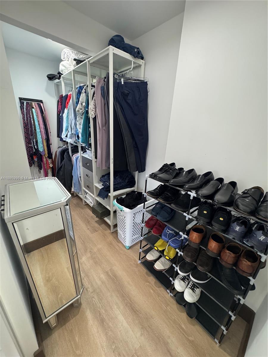 11111 Southwest 147th Court Miami, FL 33196 - Photo 35 of 42 a room with gym equipment and a mirror