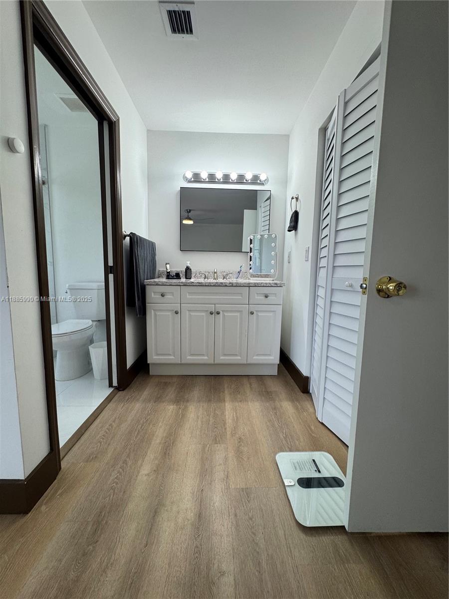 11111 Southwest 147th Court Miami, FL 33196 - Photo 36 of 42 a kitchen with stainless steel appliances granite countertop a refrigerator and a sink