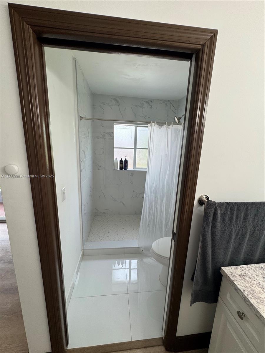 11111 Southwest 147th Court Miami, FL 33196 - Photo 37 of 42 a view of a hallway