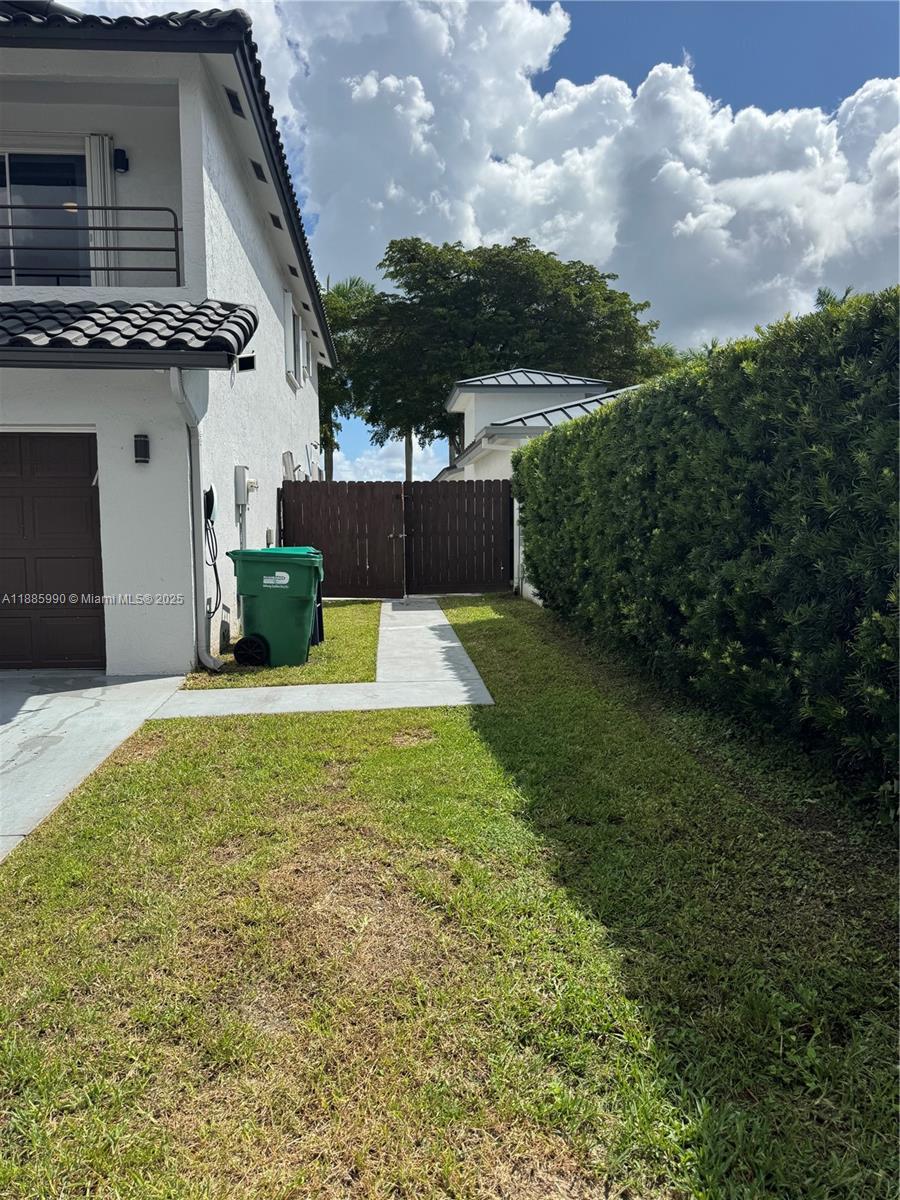 11111 Southwest 147th Court Miami, FL 33196 - Photo 6 of 42 a view of a backyard