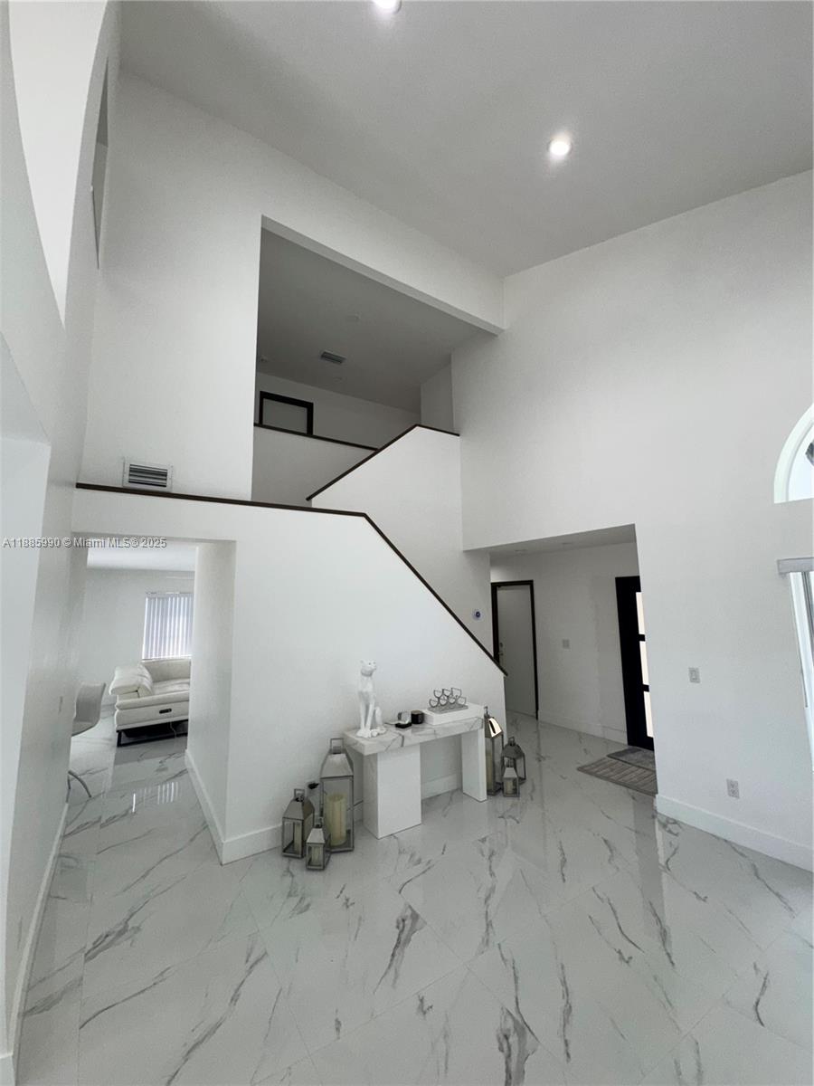 11111 Southwest 147th Court Miami, FL 33196 - Photo 10 of 42 a view of an empty room