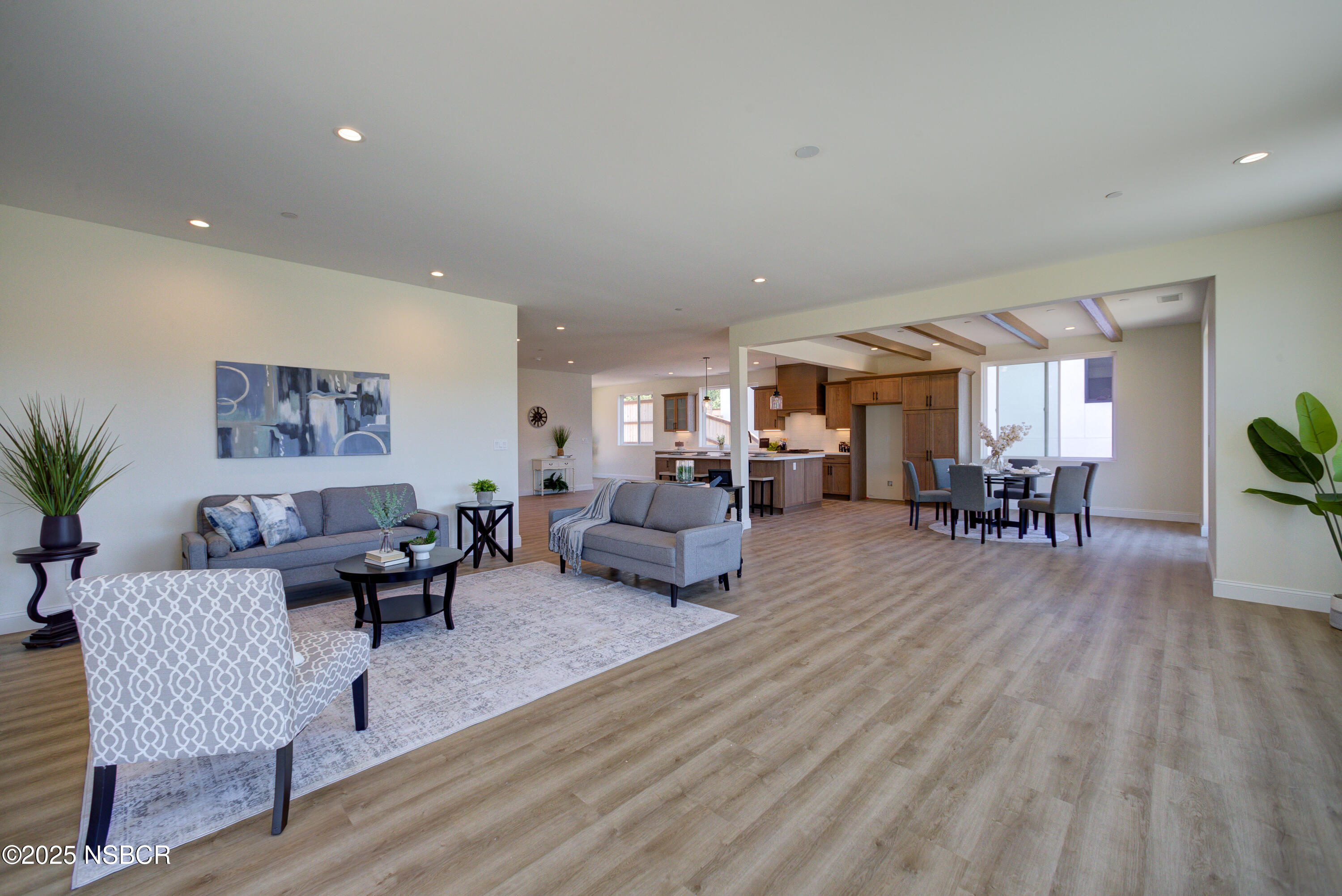 1607 Tuscan Way Santa Maria, CA 93455 - Photo 13 of 37 a living room with furniture and wooden floor