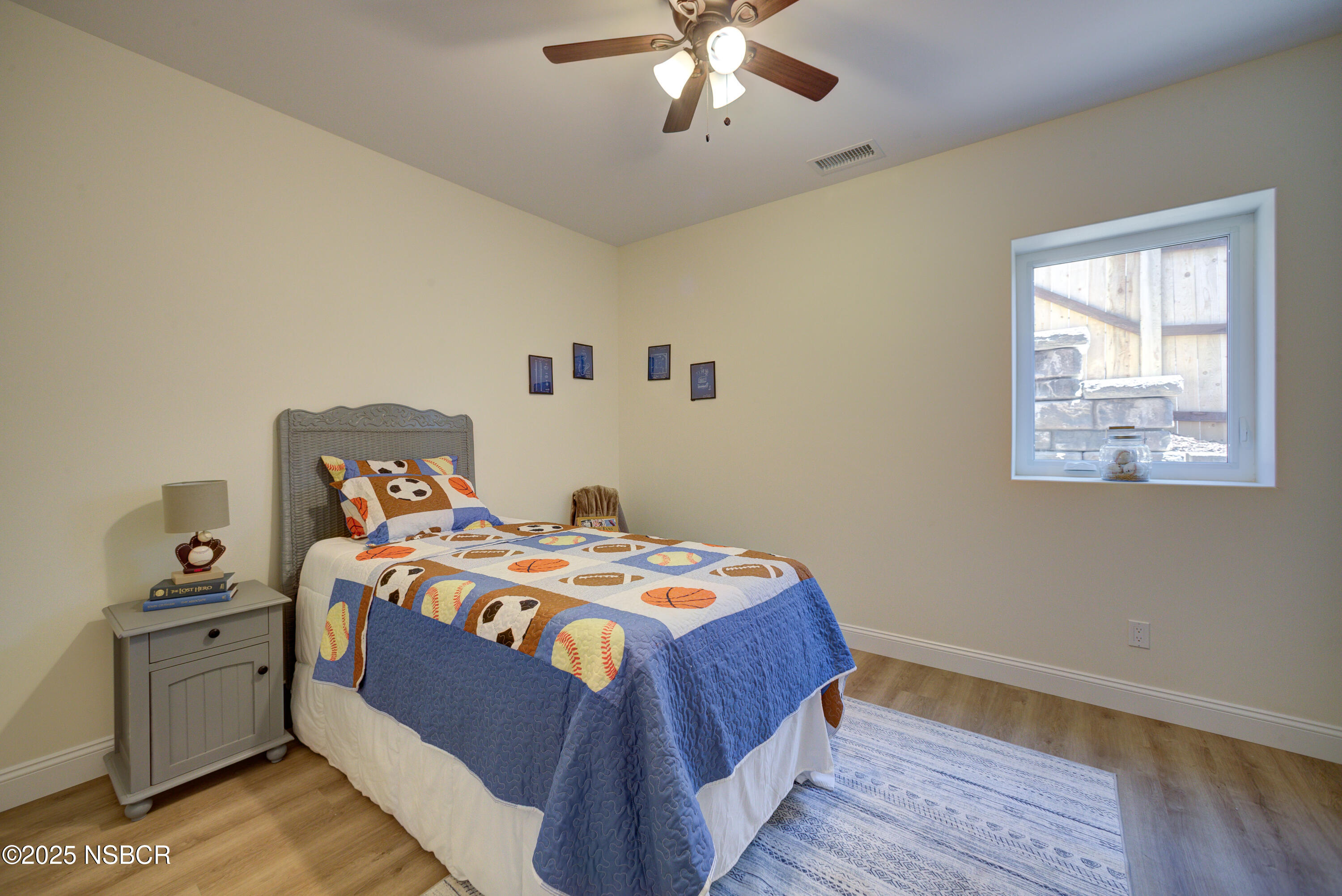 1607 Tuscan Way Santa Maria, CA 93455 - Photo 26 of 37 a bedroom with a bed and wooden floor