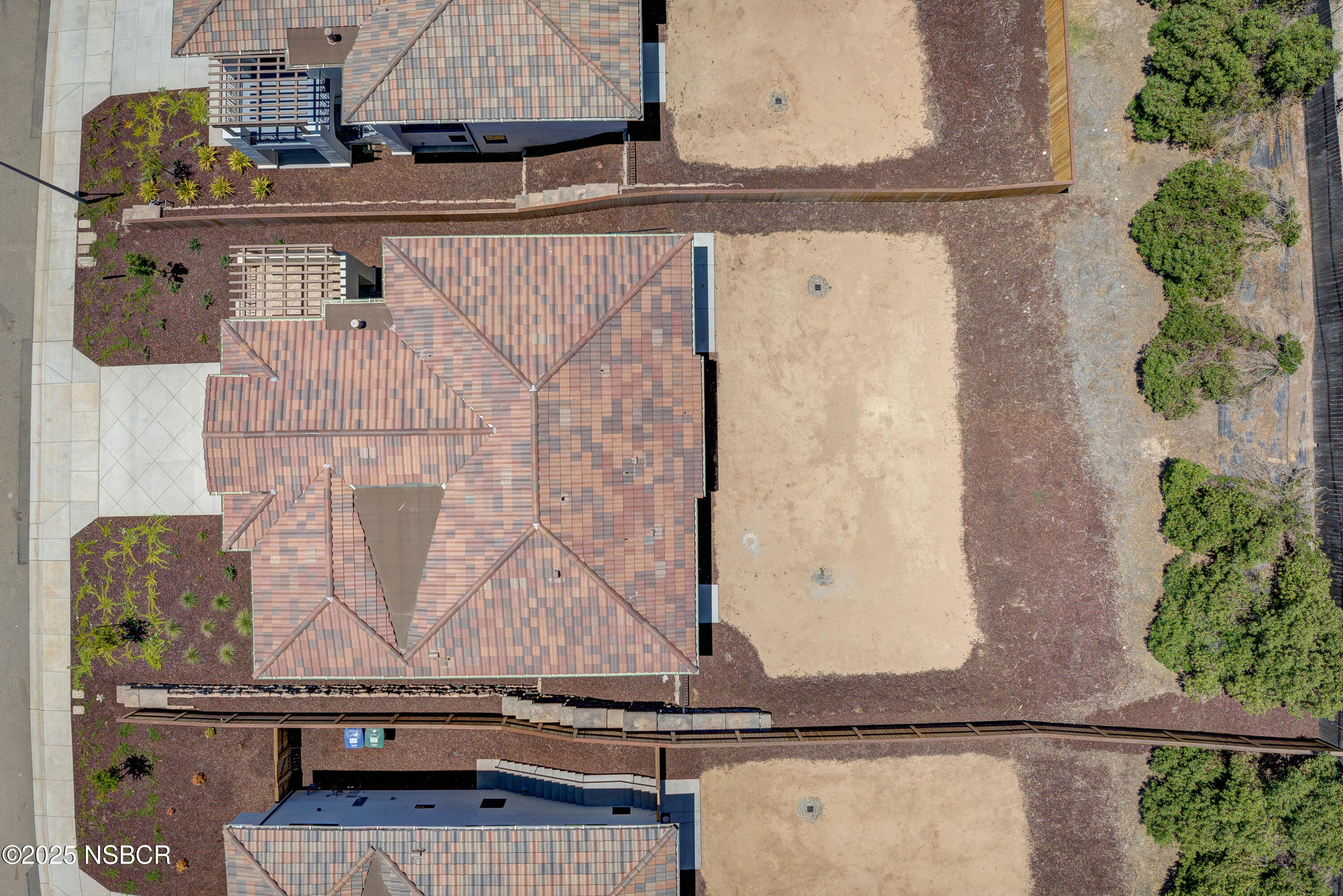 1607 Tuscan Way Santa Maria, CA 93455 - Photo 5 of 37 a white cabinet with a granite top and a white vase
