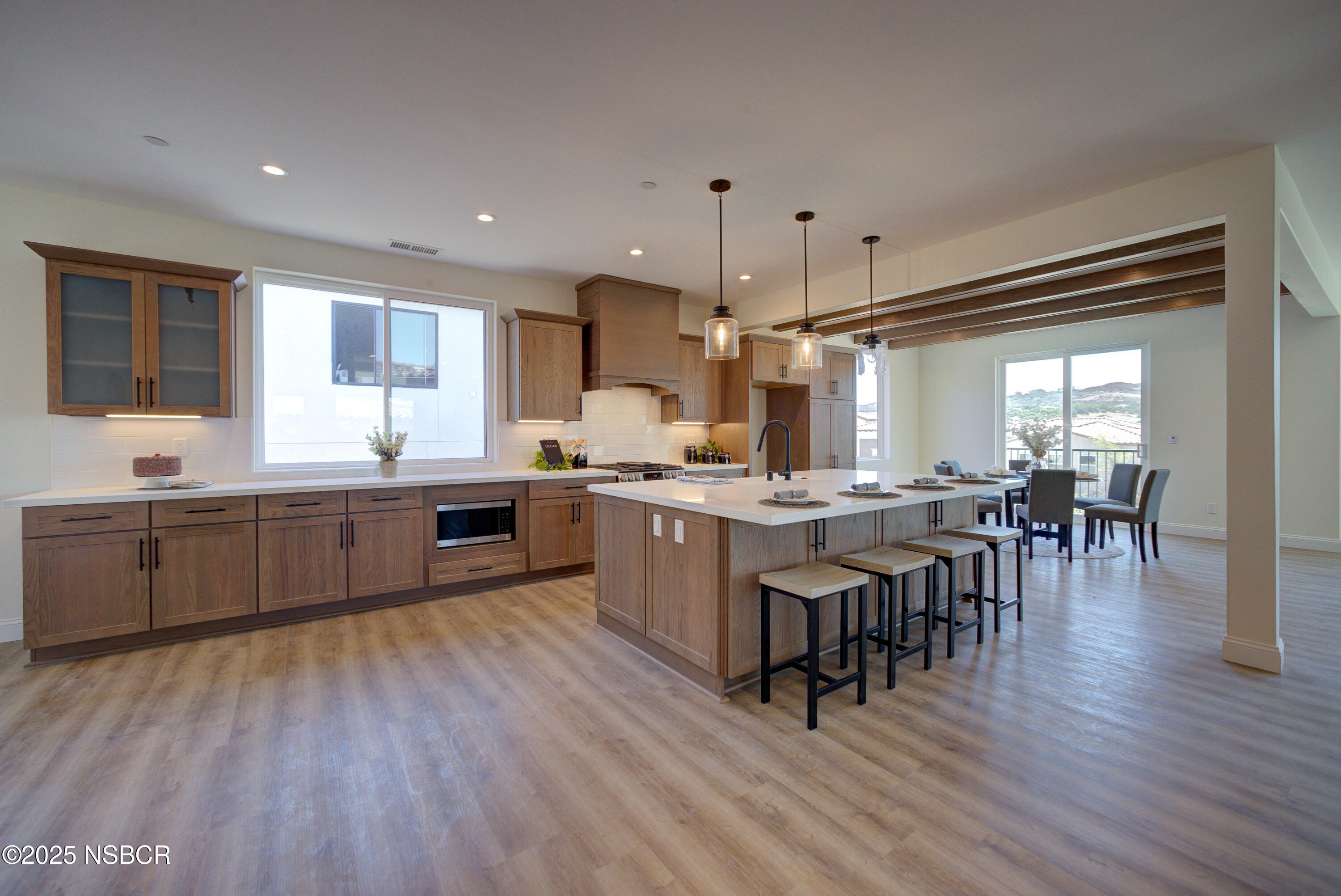 1607 Tuscan Way Santa Maria, CA 93455 - Photo 7 of 37 a kitchen with lots of counter top space and stainless steel appliances