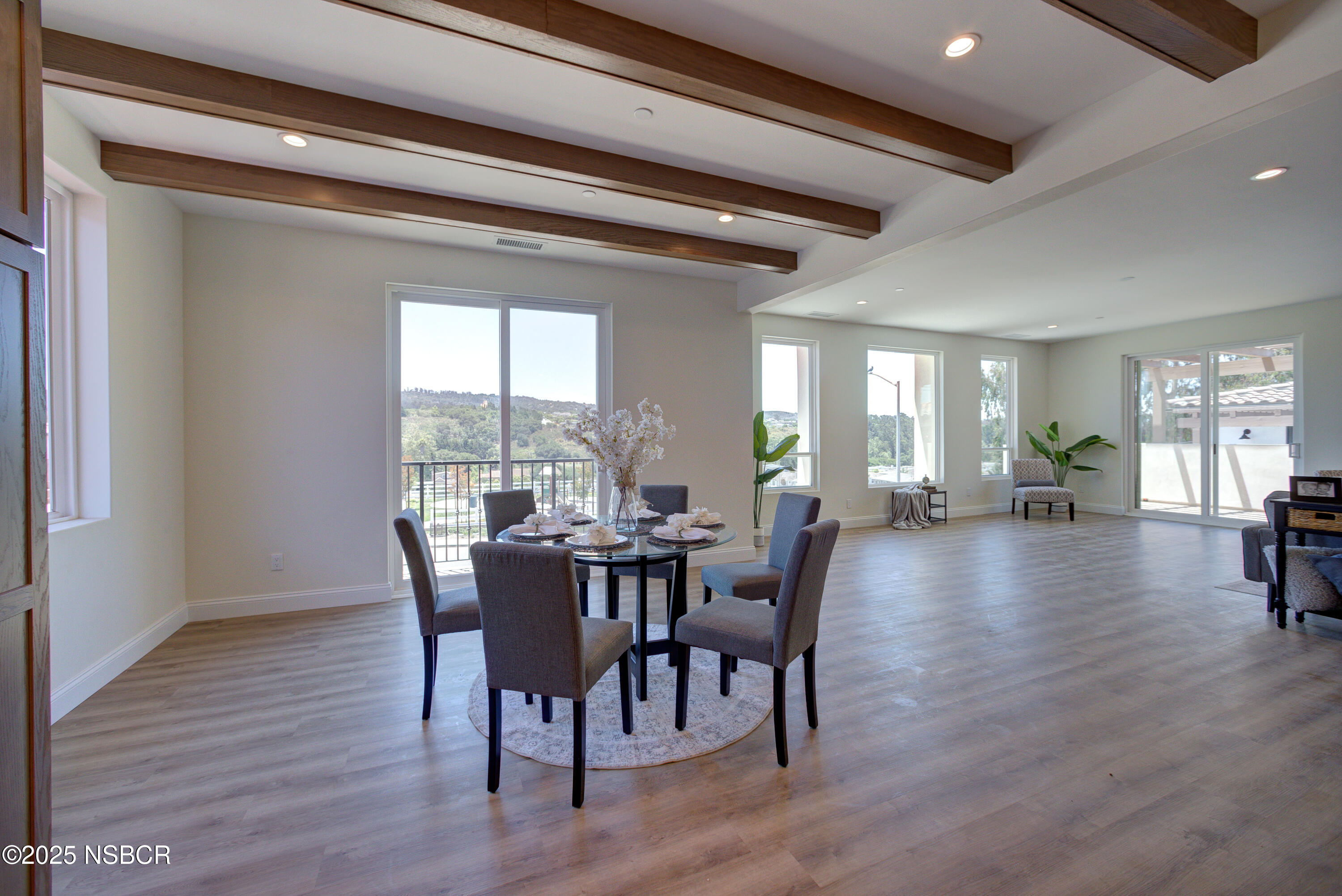 1607 Tuscan Way Santa Maria, CA 93455 - Photo 10 of 37 a view of a dining room with furniture window and wooden floor
