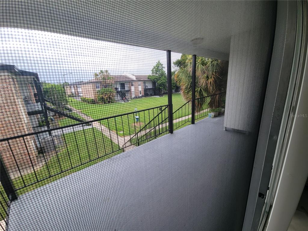 5317 Curry Ford Road, Unit 20 Orlando, FL 32812 - Photo 4 of 18 a view of balcony with ocean view