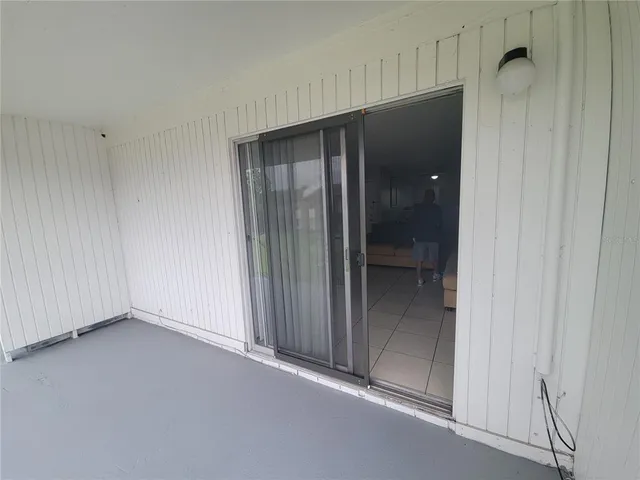 an empty room with closet area