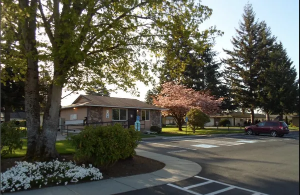 a view of a house with a garden