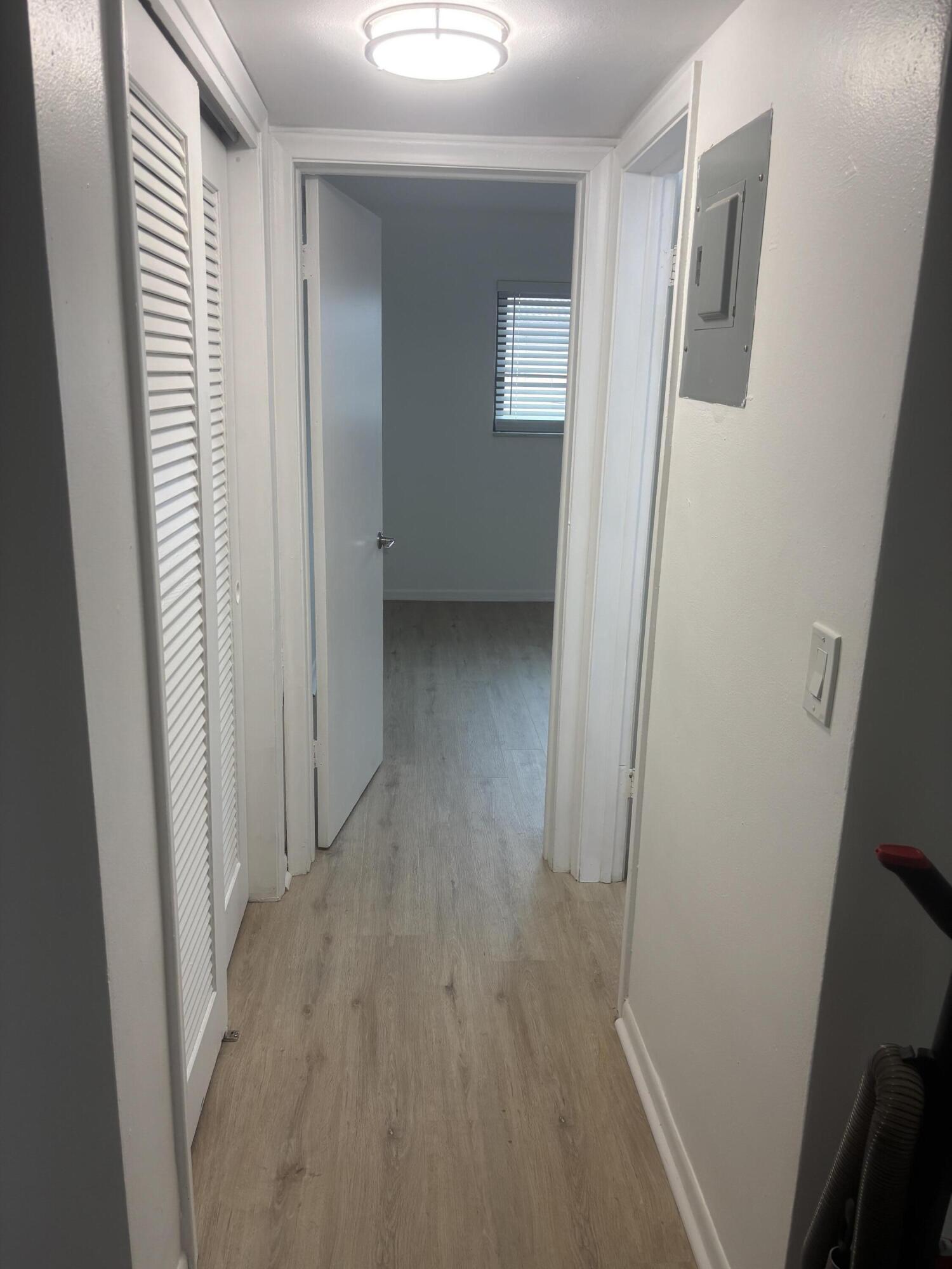 521 Northeast 45th Street Boca Raton, FL 33431 - Photo 12 of 17 a view of a hallway