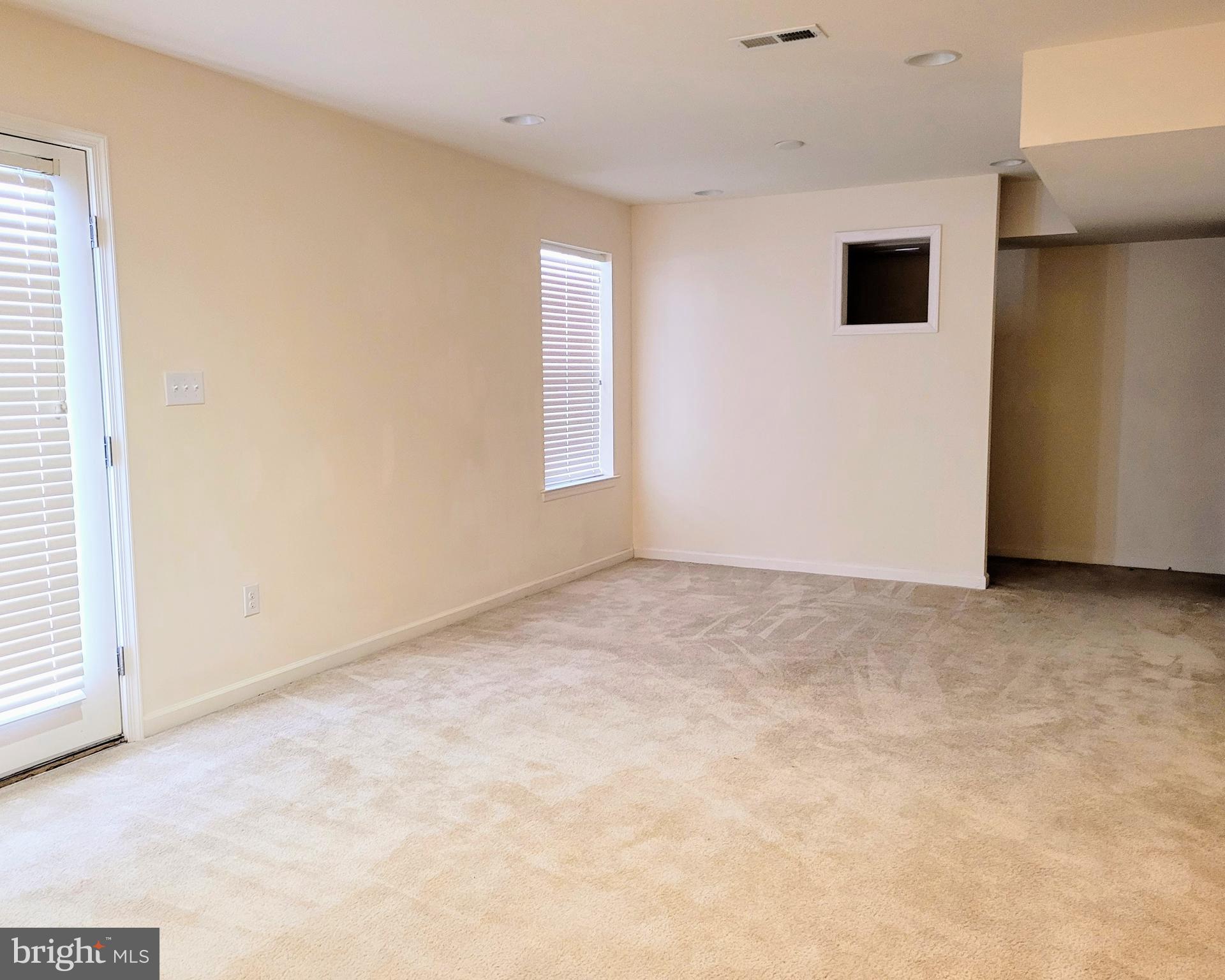 628 Rigel Way Bear, DE 19701 - Photo 18 of 20 a view of an empty room with a window