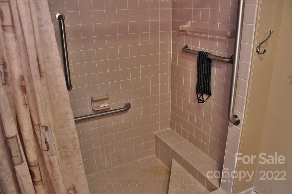 789 Tobacco Branch Road Almond, NC 28702 - Photo 15 of 42 a bathroom with a shower