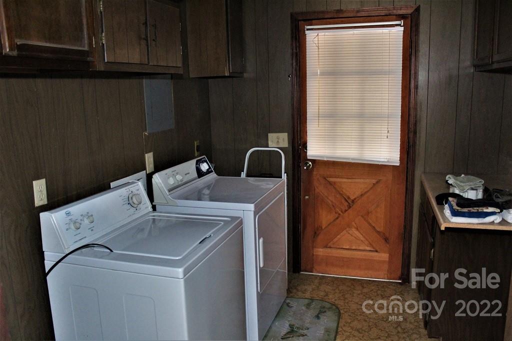 789 Tobacco Branch Road Almond, NC 28702 - Photo 22 of 42 a utility room with dryer and washer