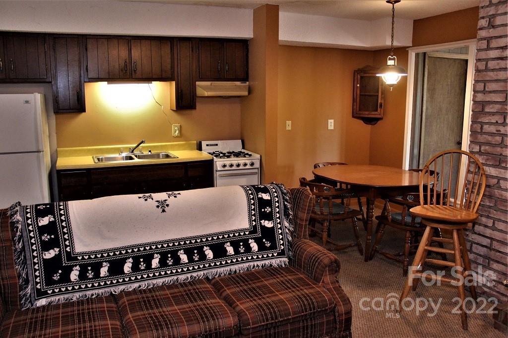 789 Tobacco Branch Road Almond, NC 28702 - Photo 24 of 42 a room with furniture and window