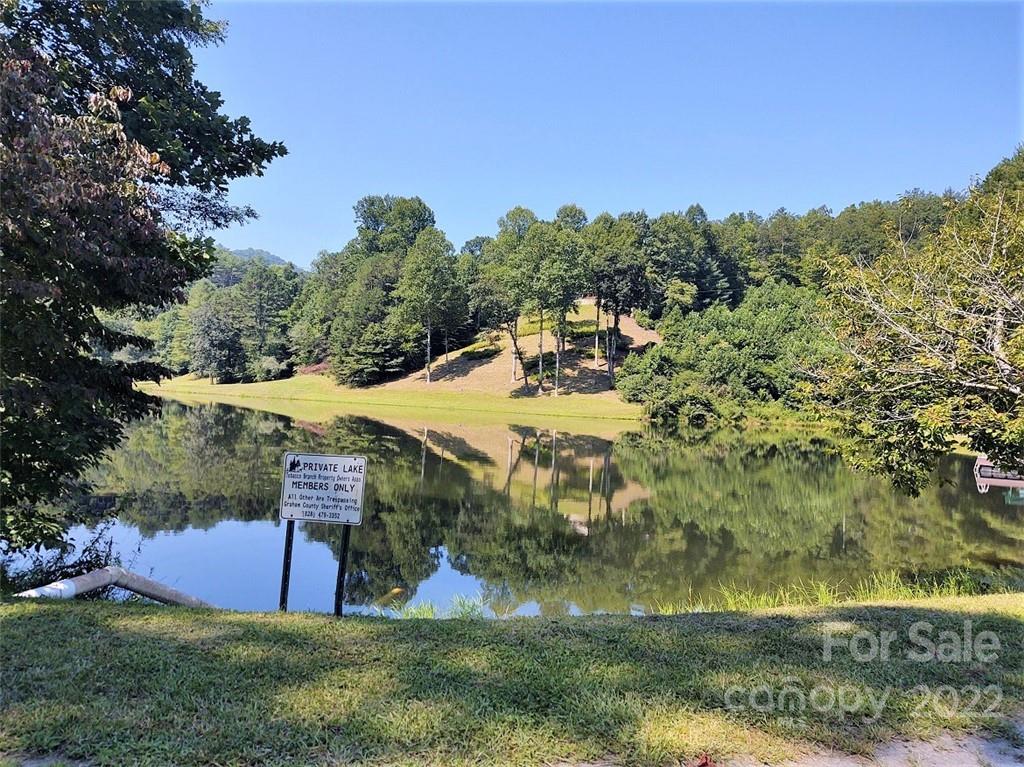 789 Tobacco Branch Road Almond, NC 28702 - Photo 38 of 42 a view of a backyard with swimming pool