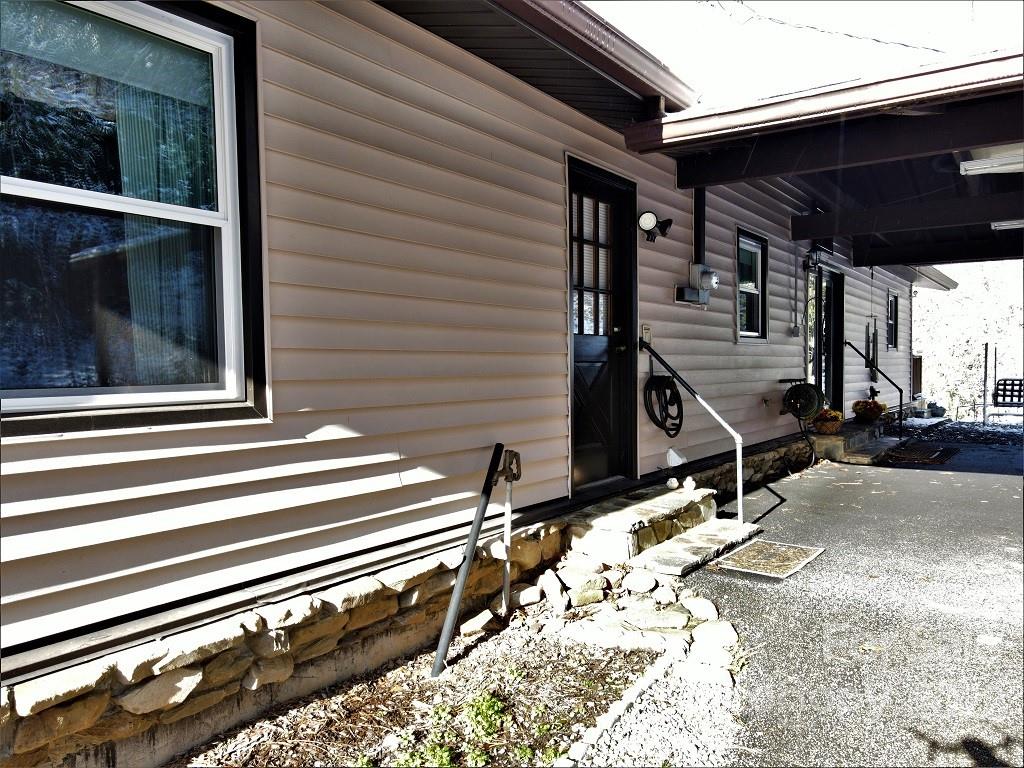 789 Tobacco Branch Road Almond, NC 28702 - Photo 6 of 42 a view of a house with a window