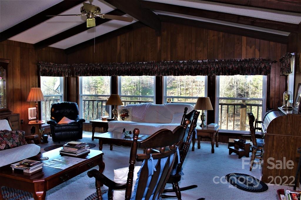 789 Tobacco Branch Road Almond, NC 28702 - Photo 10 of 42 a dining room with furniture window and wooden floor