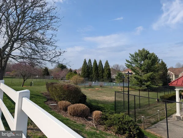 a view of a garden from a balcony