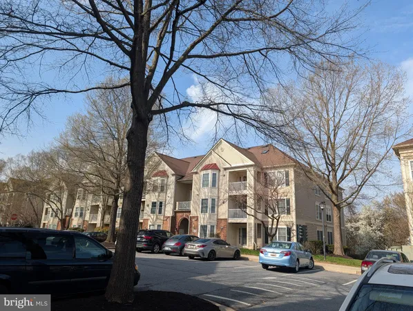 a city street lined with buildings and cars