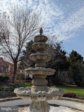 a view of a fountain in middle of the house