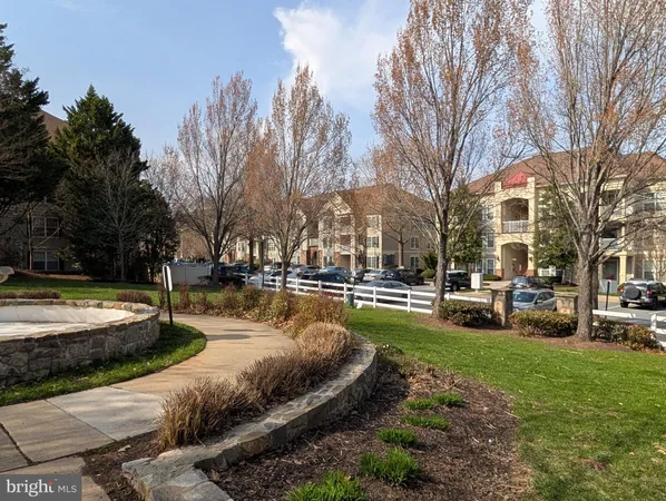 a swimming pool with outdoor seating and yard