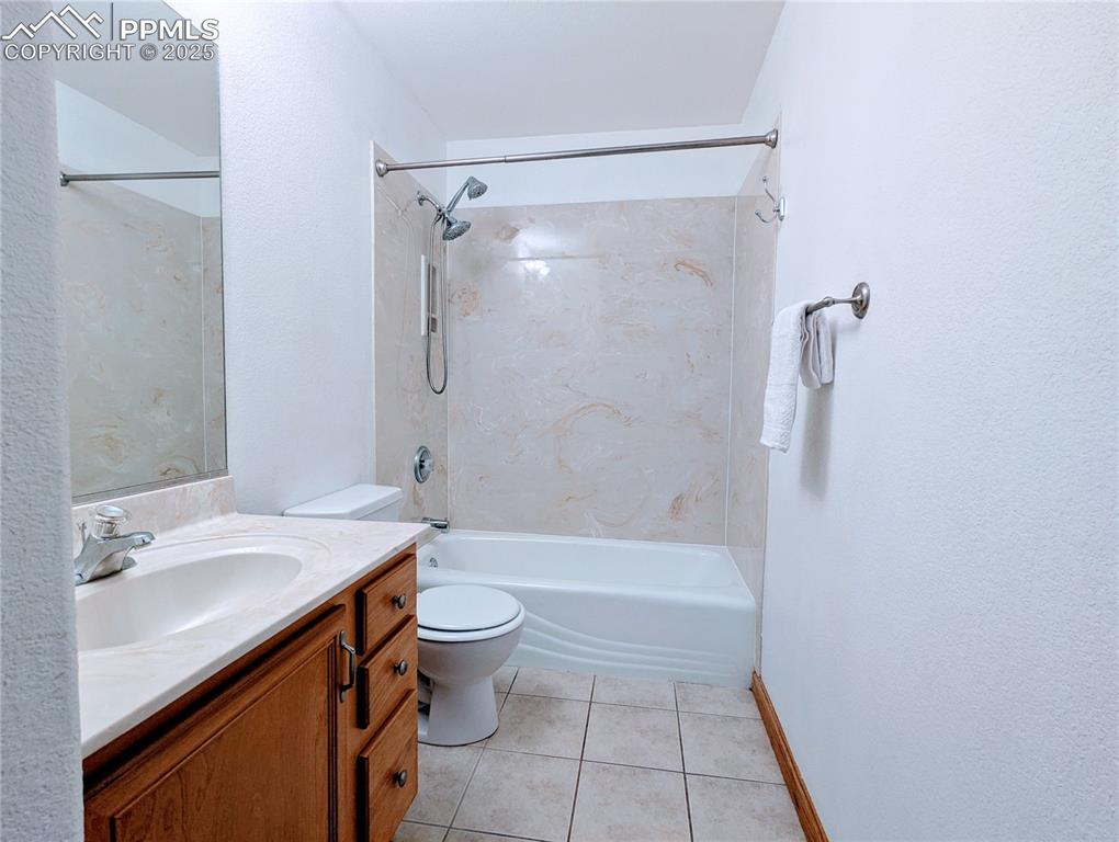 7326 Legacy Point Fountain, CO 80817 - Photo 12 of 18 a bathroom with a sink a toilet and shower