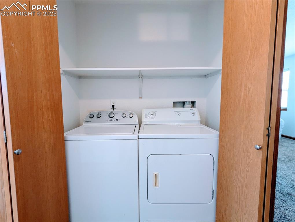 7326 Legacy Point Fountain, CO 80817 - Photo 17 of 18 a utility room with dryer and washer