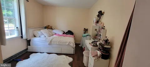 a kitchen with a stove and a refrigerator