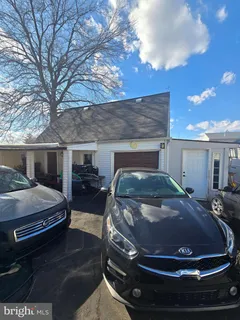 a room with closet and a large window