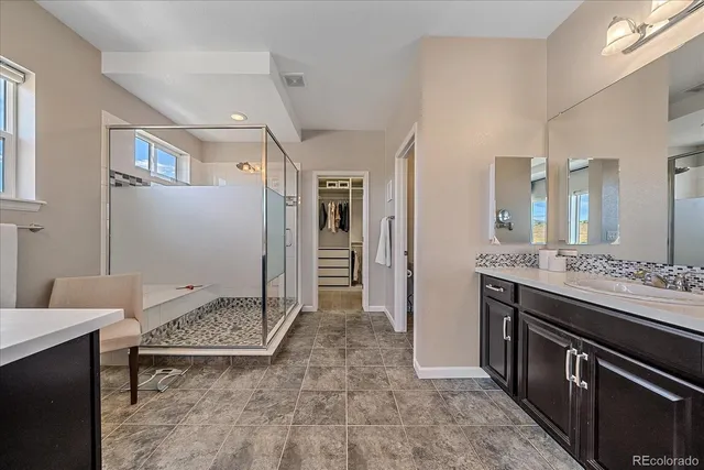 a view of a workspace with furniture