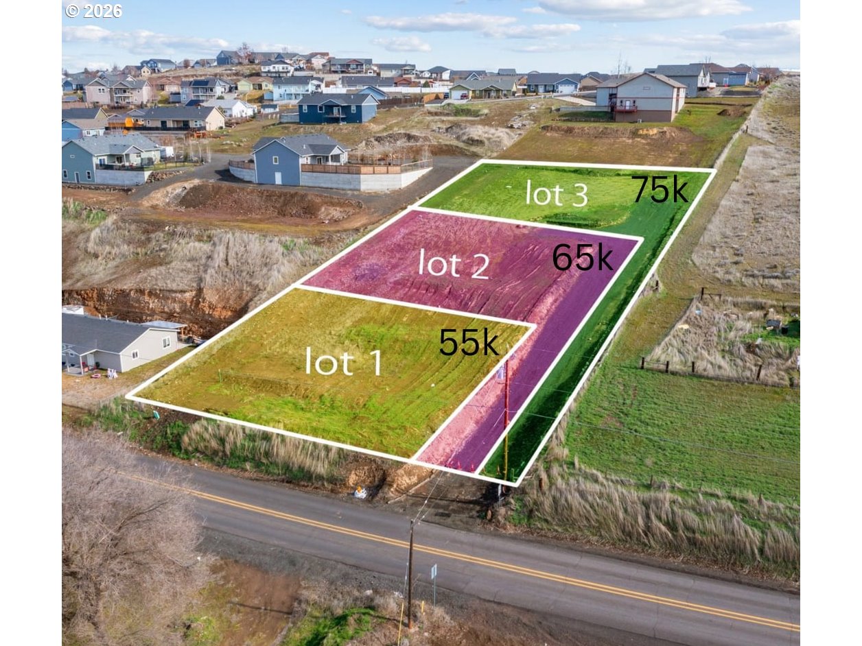 a view of a tennis ground with a wooden floor
