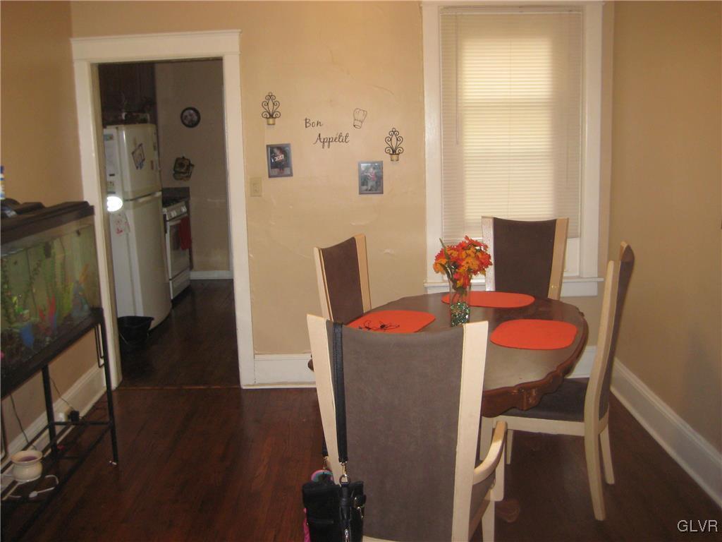 1003 Spring Street Bethlehem, PA 18018 - Photo 6 of 13 a dining room with furniture and wooden floor