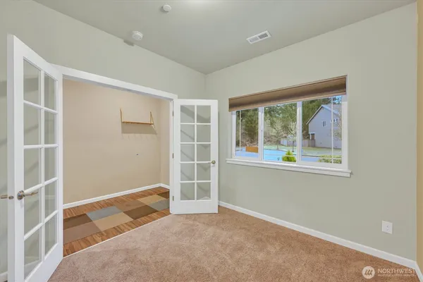 an empty room with windows