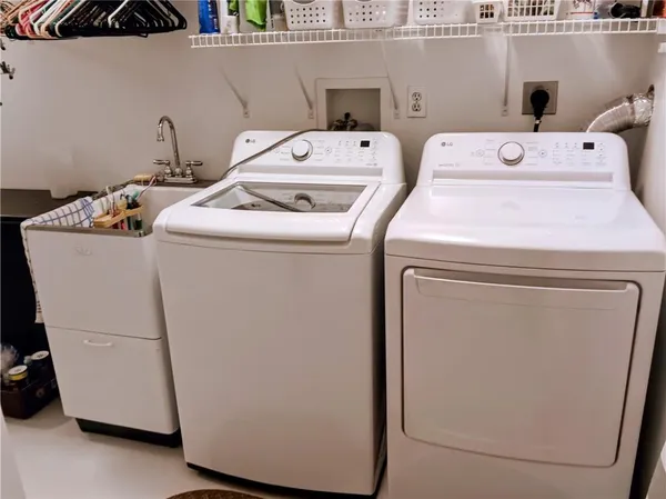 a utility room with dryer and washer