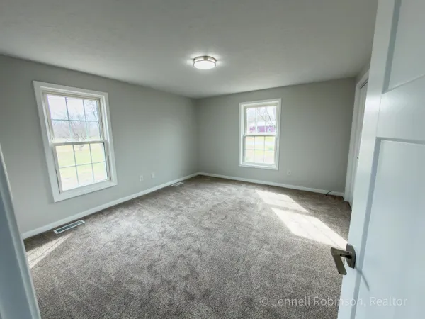 $585,000 | 7154 Morse Lake Avenue Southeast, Unit A, Alto, MI 49302