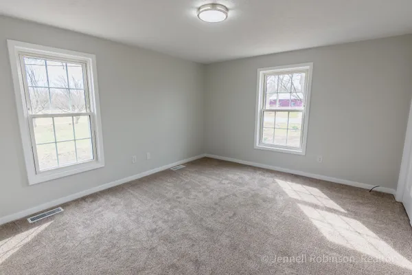 $585,000 | 7154 Morse Lake Avenue Southeast, Unit A, Alto, MI 49302