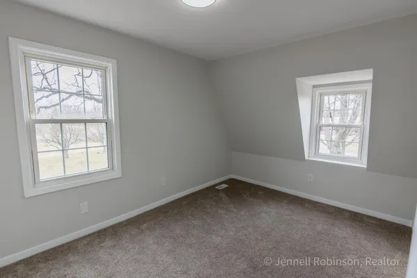 $585,000 | 7154 Morse Lake Avenue Southeast, Unit A, Alto, MI 49302