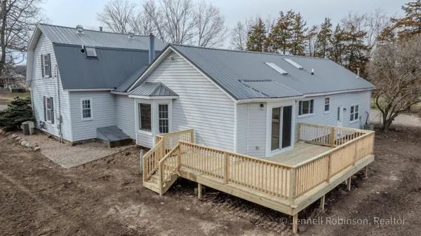 $585,000 | 7154 Morse Lake Avenue Southeast, Unit A, Alto, MI 49302