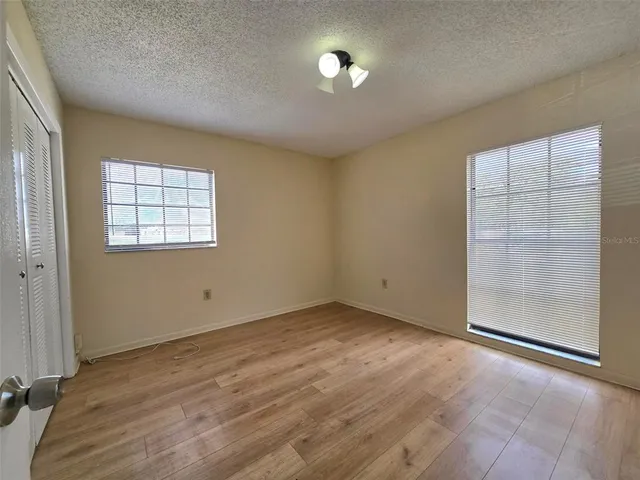 an empty room with windows