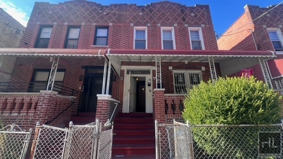 798 Miller Avenue, Unit 1 Brooklyn, NY 11207 - Photo 11 of 14 a view of a brick house with many windows