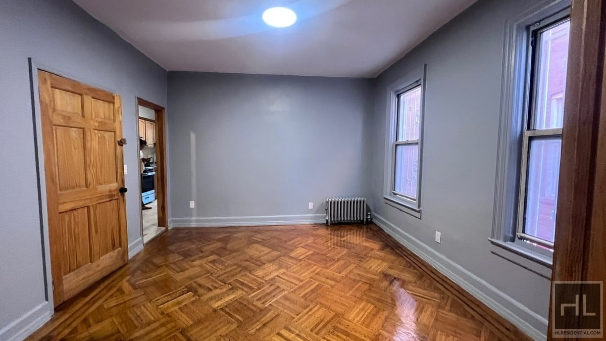 798 Miller Avenue, Unit 1 Brooklyn, NY 11207 - Photo 3 of 14 a view of an empty room with a window